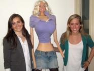 Perry Ryan '12 and Galia Slayen '13 with Slayen's life-size Barbie doll